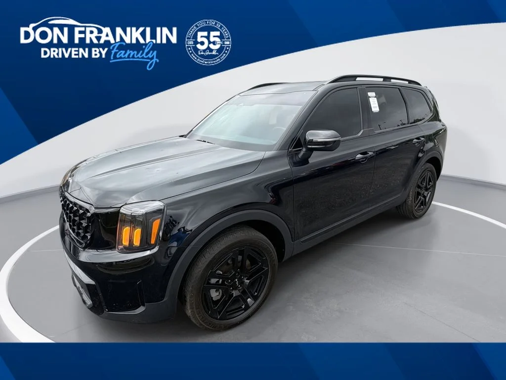 Used 2024 Black Kia EX X-Line image 1