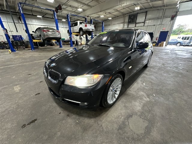 Used 2011 Black BMW 335i xDrive image 1