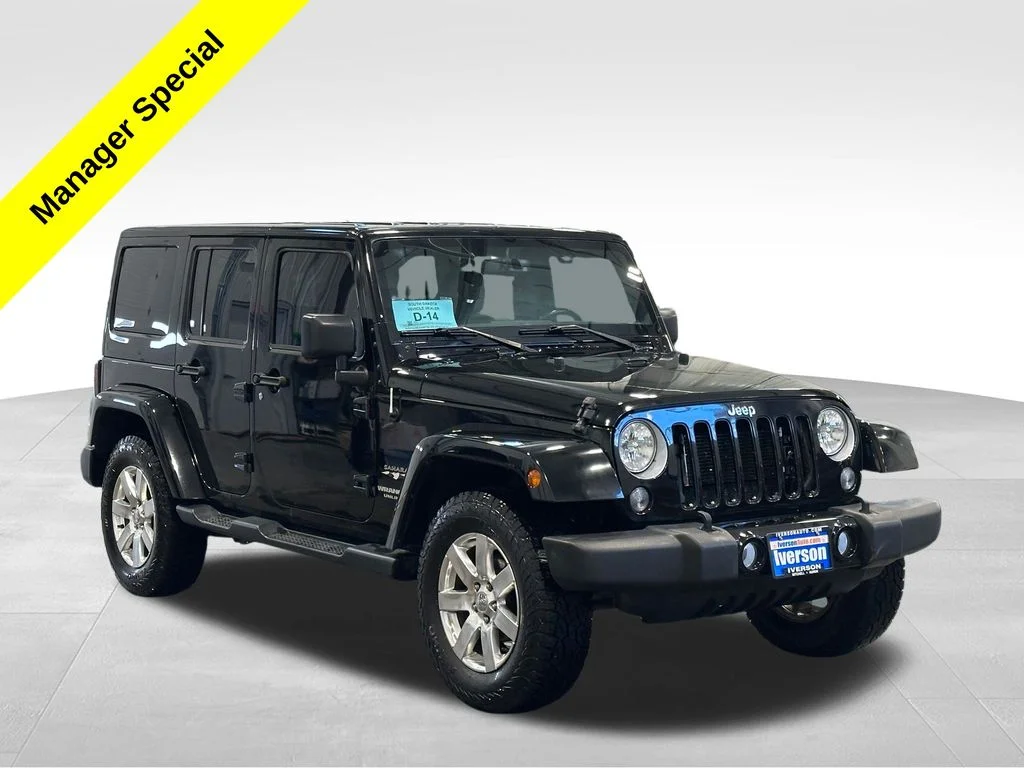 Used 2016 Black Jeep Unlimited Sahara image 1