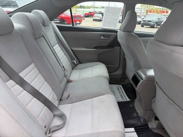 Used 2016 Midnight Black Metallic Toyota LE image 16