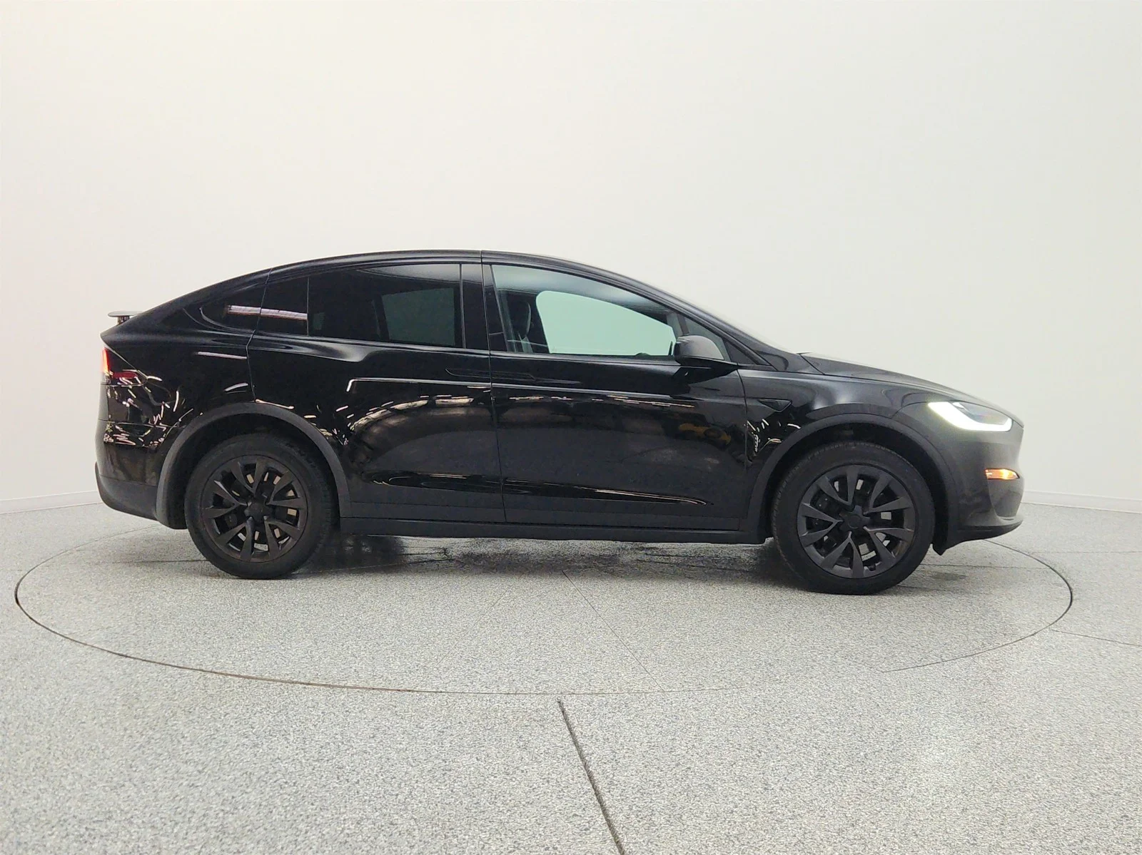 Used 2023 Solid Black Tesla AWD image 4