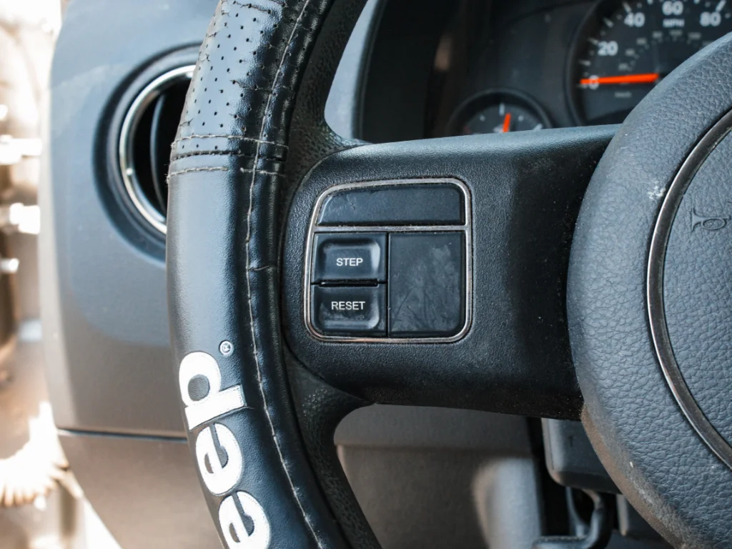 Used 2012 Bright Silver Metallic Clearcoat Jeep Sport image 10