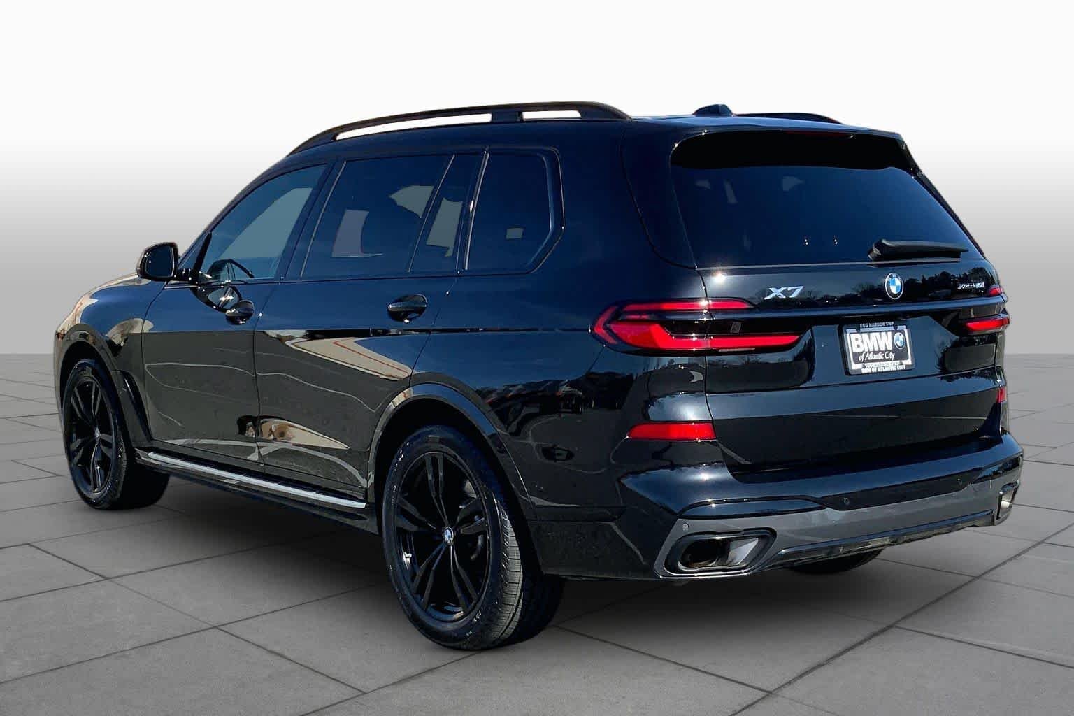 Certified Used 2024 Black Sapphire Metallic BMW xDrive40i image 11