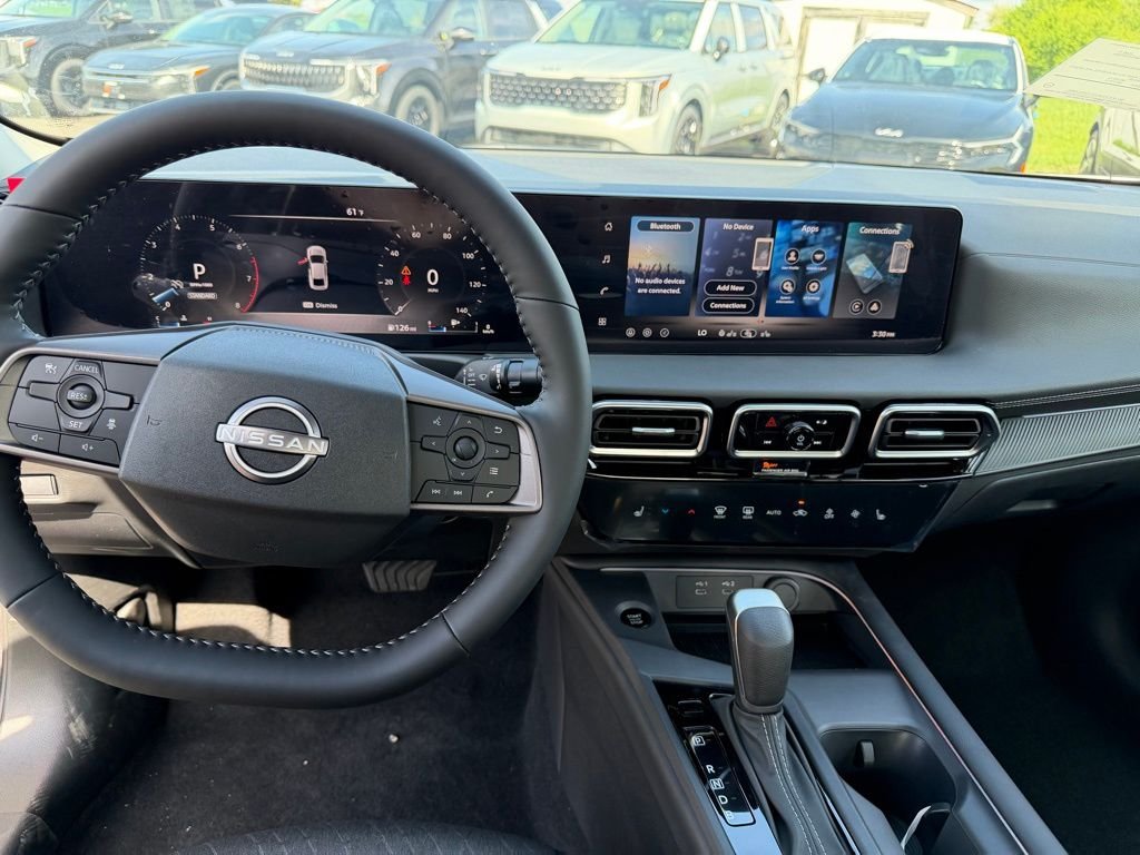 New 2026 Gun Metallic Nissan SV image 9