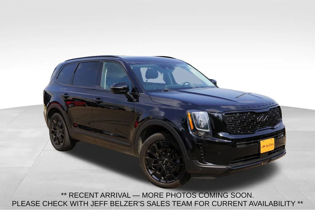 Used 2022 Ebony Black Kia EX image 1