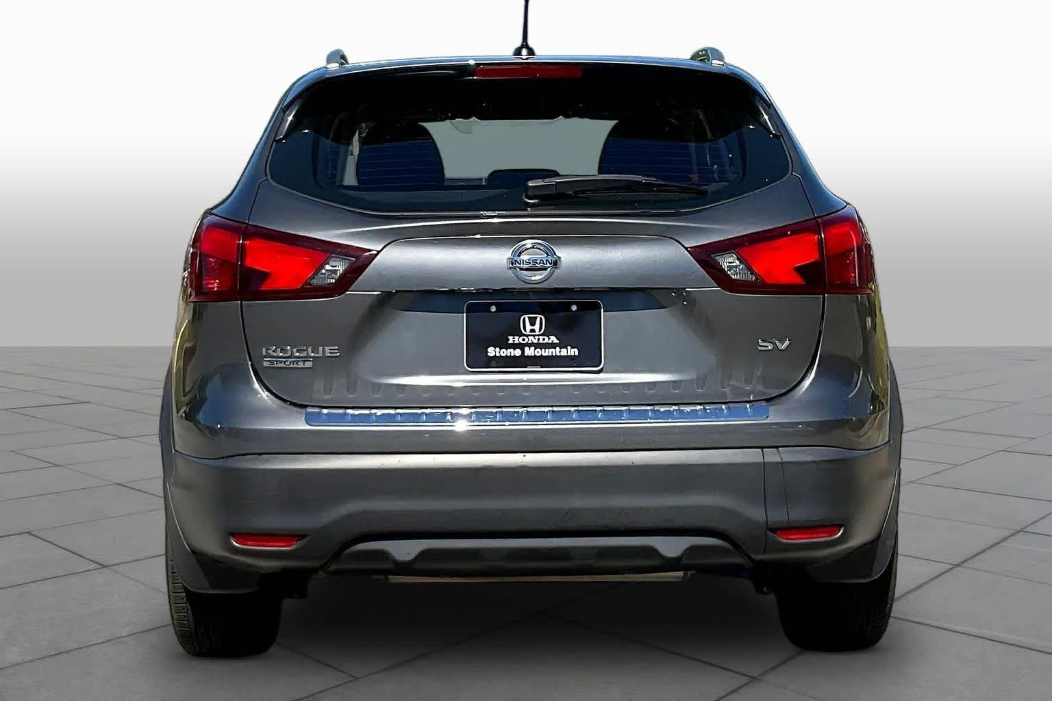 Used 2018 Gun Metallic Nissan SV image 5
