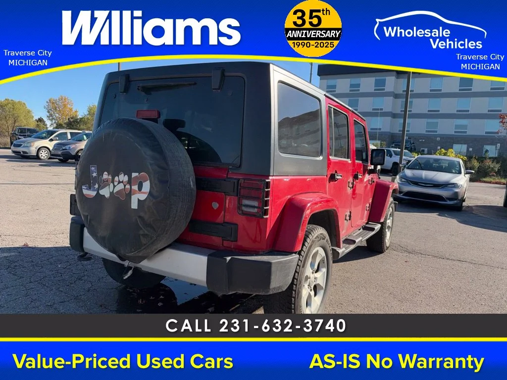 Used 2013 Flame Red Jeep Unlimited Sahara image 5