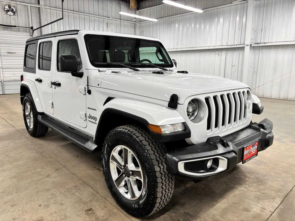 Used 2021 White Jeep Unlimited Sahara image 1