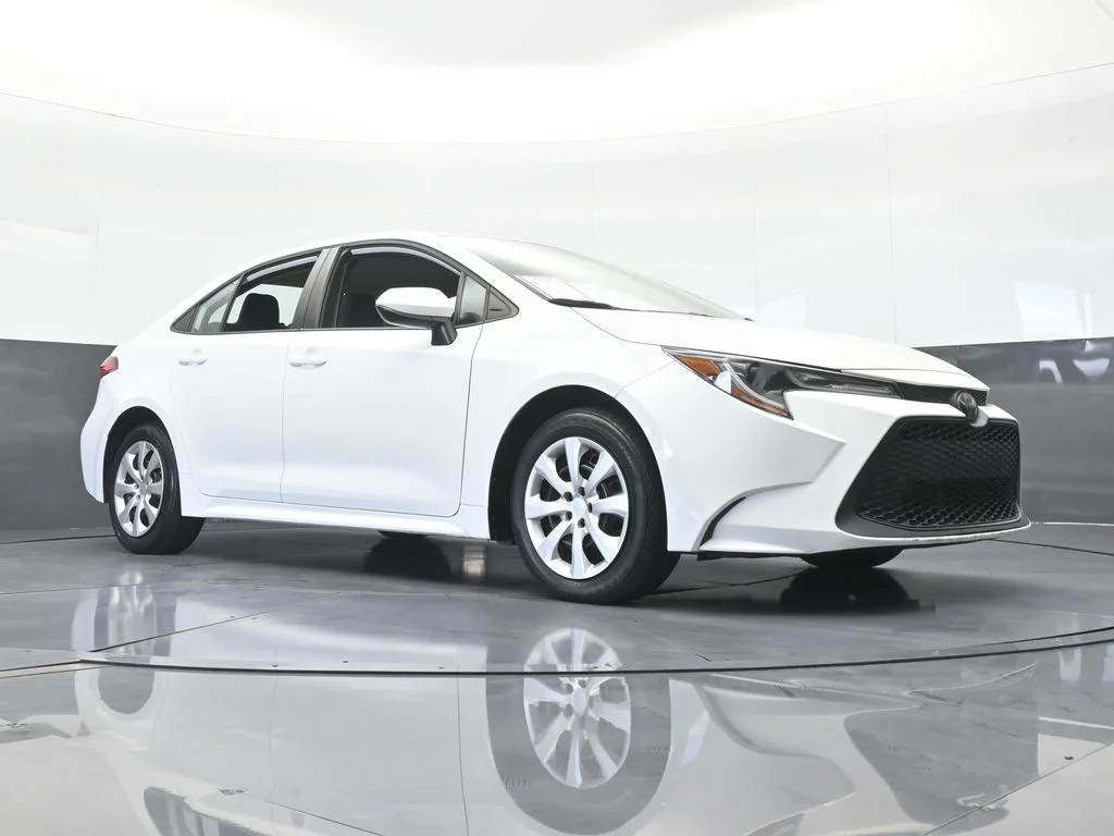 Used 2021 Super White Toyota LE image 51