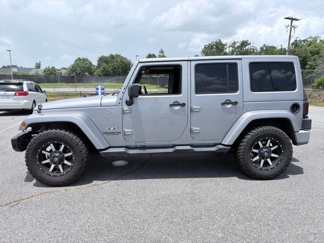Used 2016 Silver Jeep Unlimited Sahara image 6