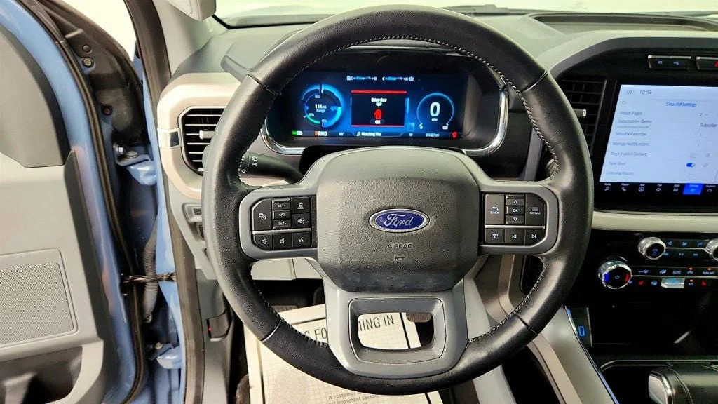 Used 2023 Azure Gray Metallic Tri-Coat Ford XLT 4WD SuperCrew 5.5