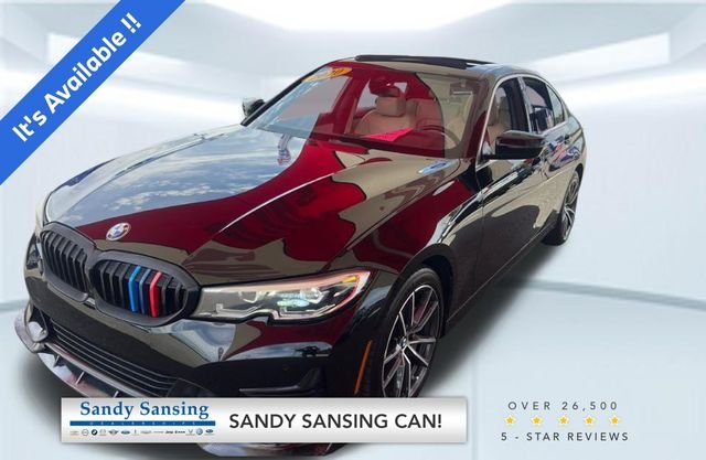Used 2020 Black BMW 330i image 1