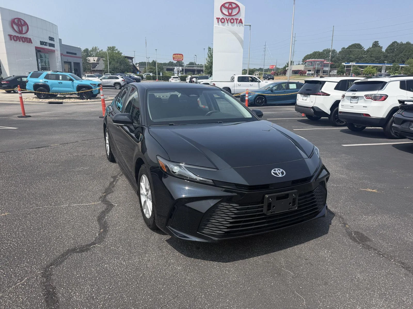 Used 2025 Midnight Black Metallic Toyota LE image 3