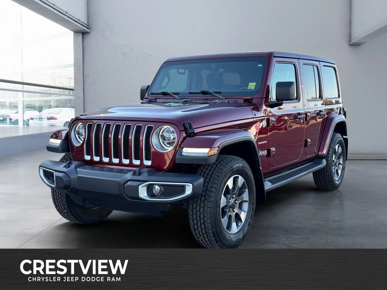 Certified Used 2021 Snazzberry Pearl Jeep Unlimited Sahara image 1