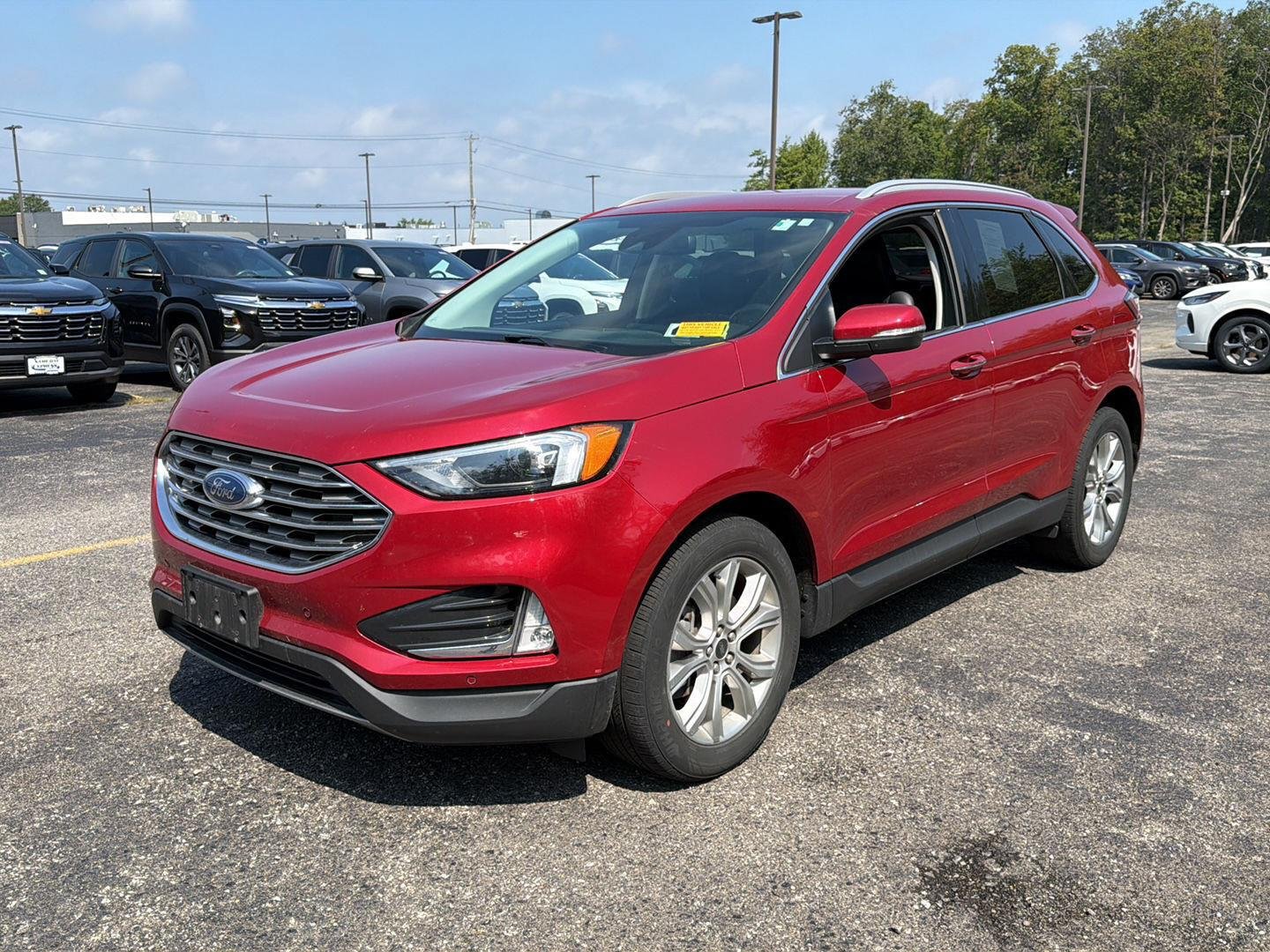 Used 2024 Rapid Red Metallic Tinted Clearcoat Ford Titanium image 7