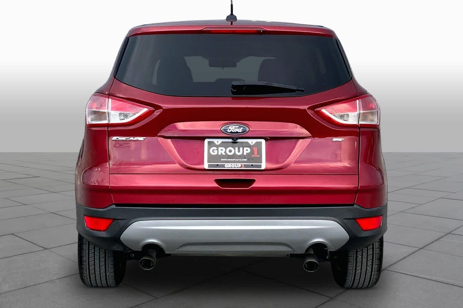 Used 2016 Ruby Red Metallic Tinted Clearcoat Ford SE image 5