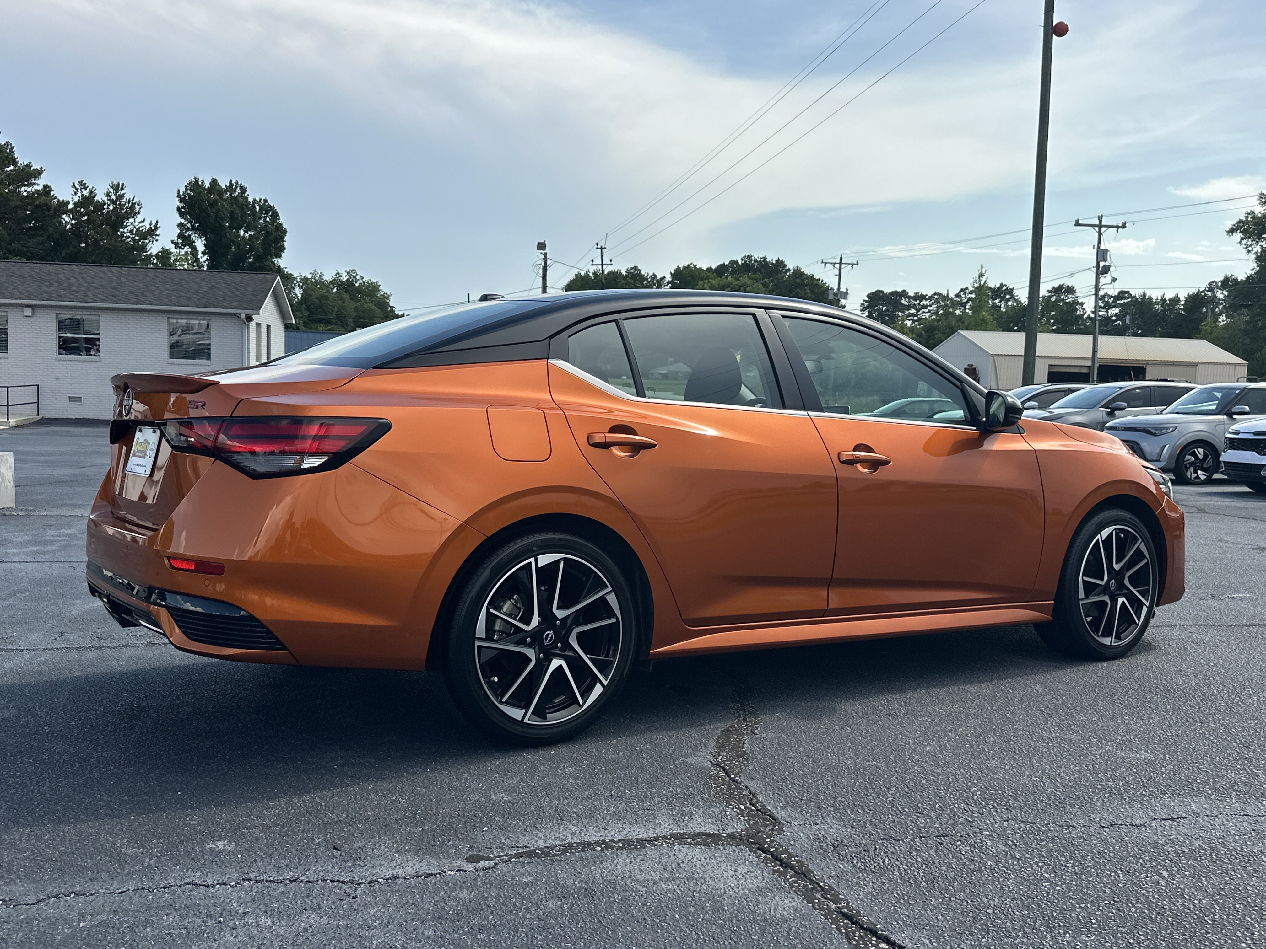 Used 2024 Monarch Orange Metallic/Super Black Nissan SR image 7