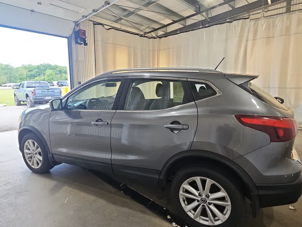 Used 2017 Gun Metallic Nissan SV image 2