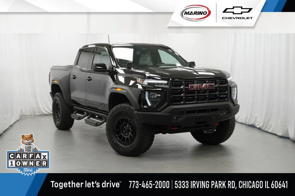 Used 2024 Onyx Black GMC AT4X image 1