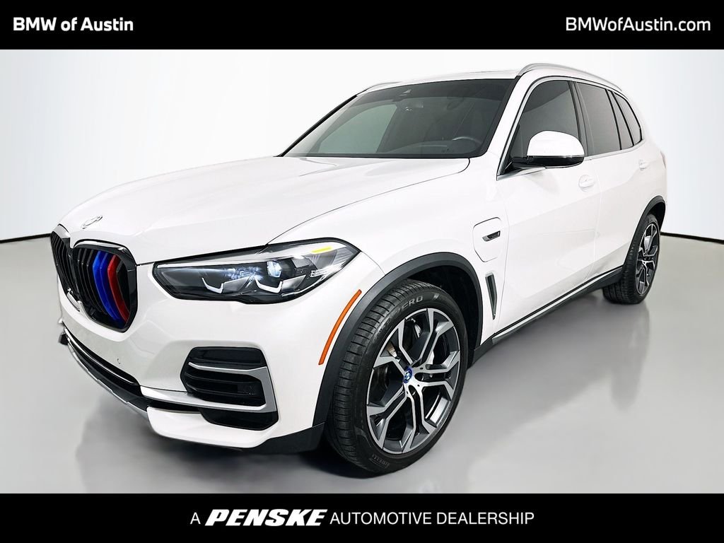 Used 2022 Mineral White Metallic BMW xDrive45e image 1