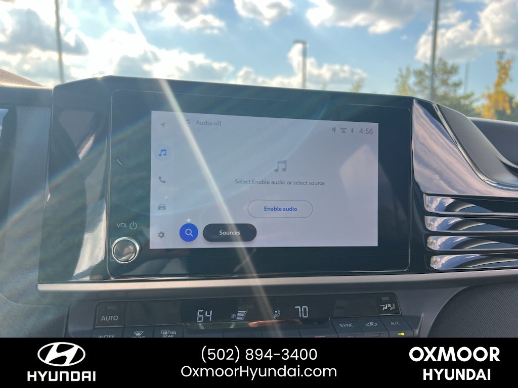 Used 2025 Reservoir Blue Toyota LE image 13