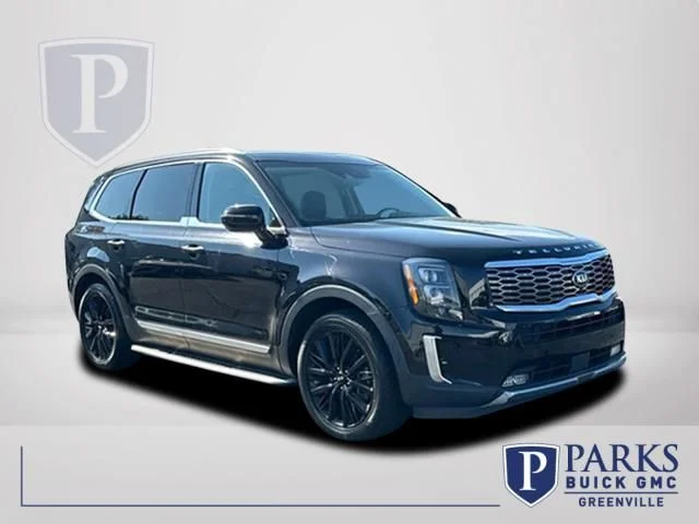 Used 2021 Black Kia SX image 1