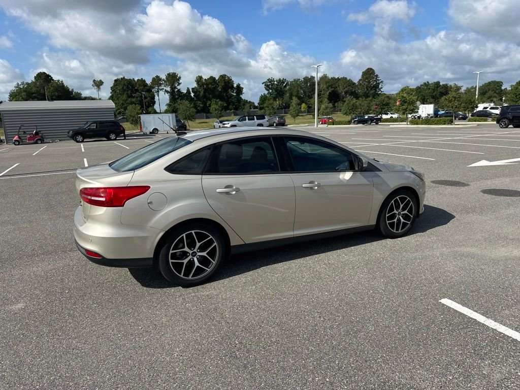 Used 2017 Gold Ford SEL image 4