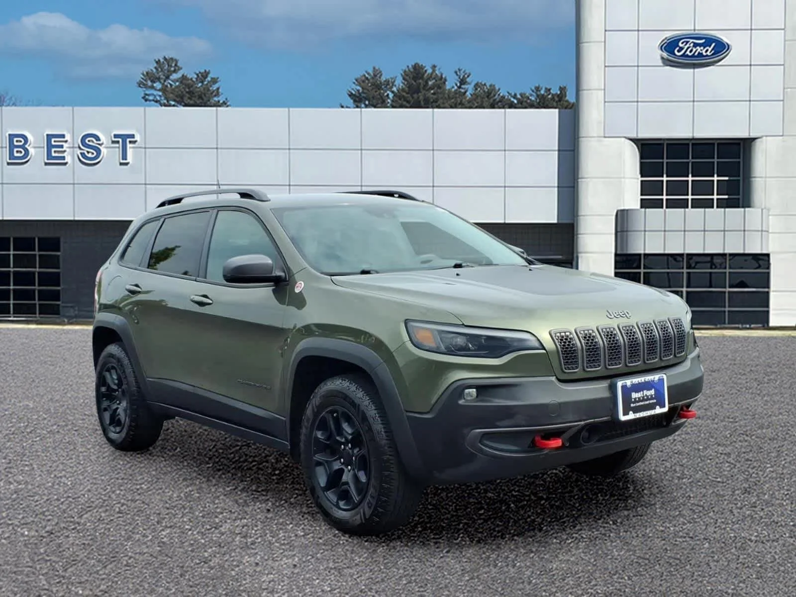 Used 2021 Olive Green Pearlcoat Jeep Trailhawk image 9