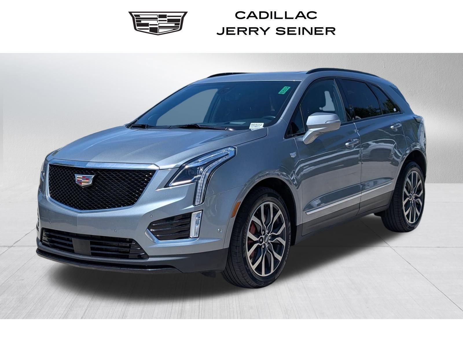 Used 2023 Argent Silver Metallic Cadillac Sport image 1