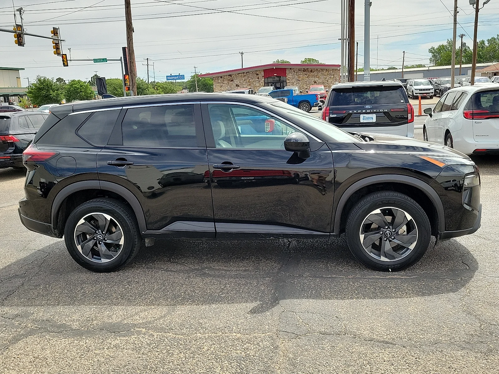 Certified Used 2025 Super Black Nissan SV Intelligent AWD image 12