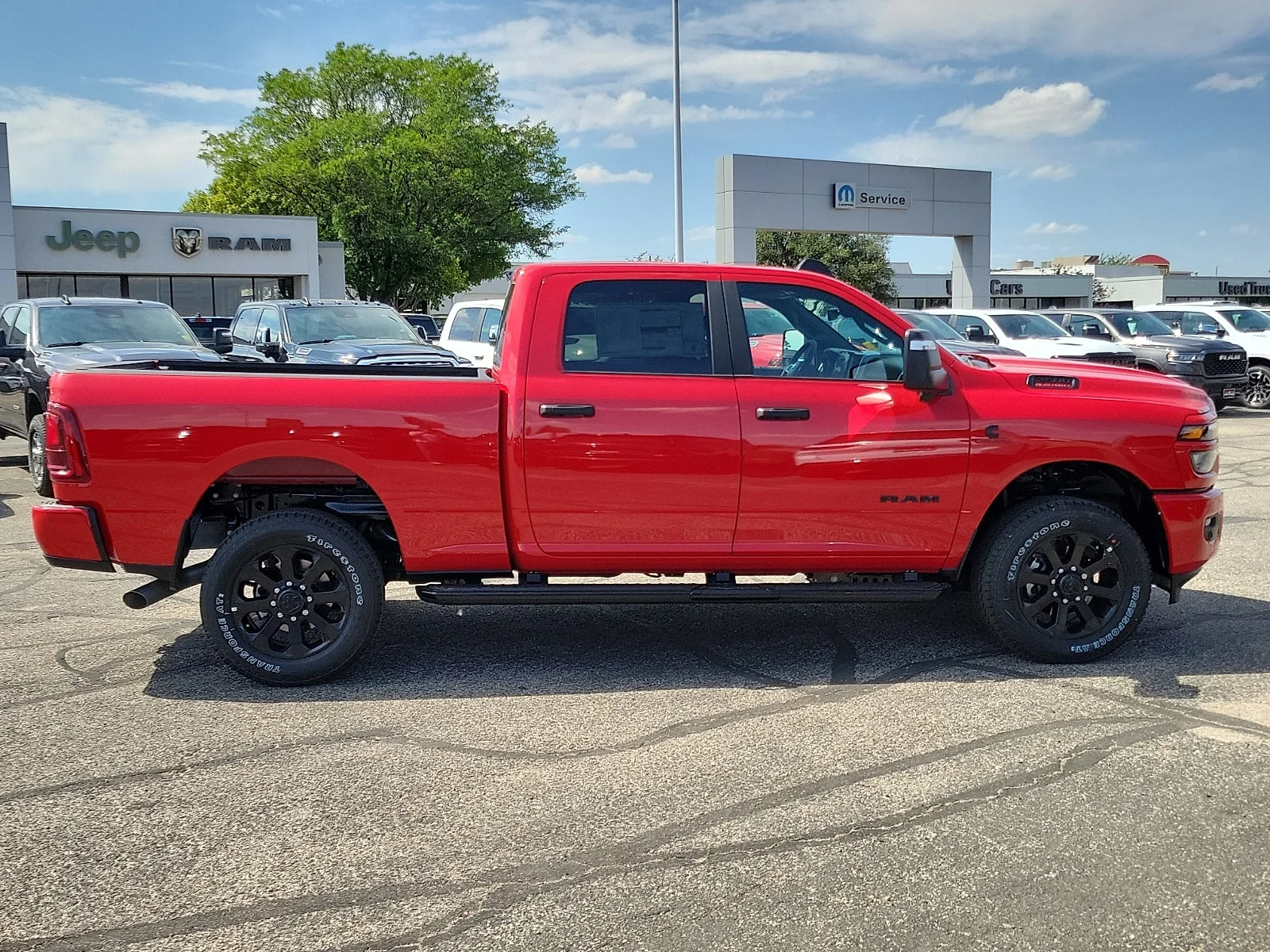 New 2026 Flame Red Ram LONE STAR CREW CAB 4X4 6