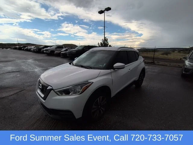 Used 2019 White Nissan SV image 1
