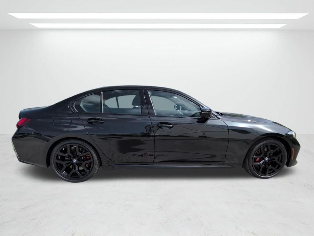 New 2026 Black Sapphire Metallic BMW 330i image 3