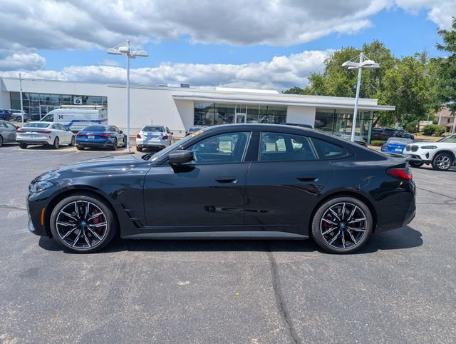 Certified Used 2023 Black Sapphire Metallic BMW eDrive40 image 1