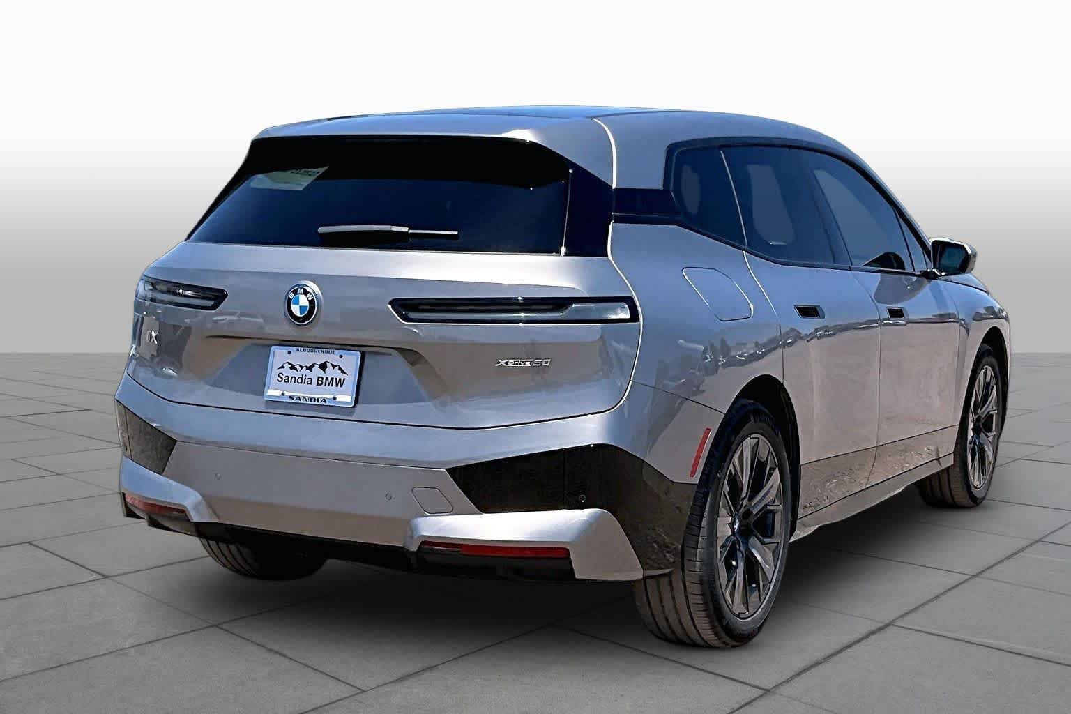 Used 2024 Oxide Grey Metallic BMW xDrive50 image 10