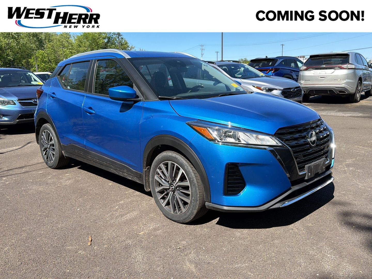 Used 2022 Electric Blue Metallic Nissan SV image 1