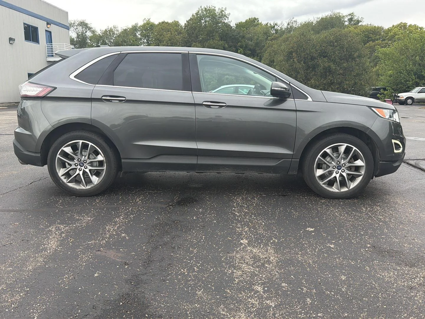 Used 2015 Magnetic Metallic FORD Titanium image 4