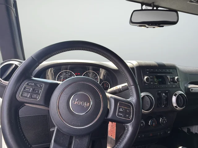 Used 2017 White Jeep Unlimited Sahara image 9