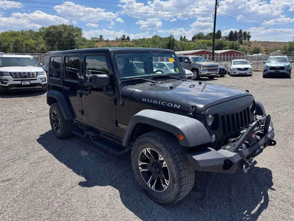 Used 2016 Black Clearcoat Jeep Unlimited Rubicon image 1