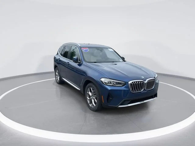 Used 2022 Blue BMW sDrive30i image 1
