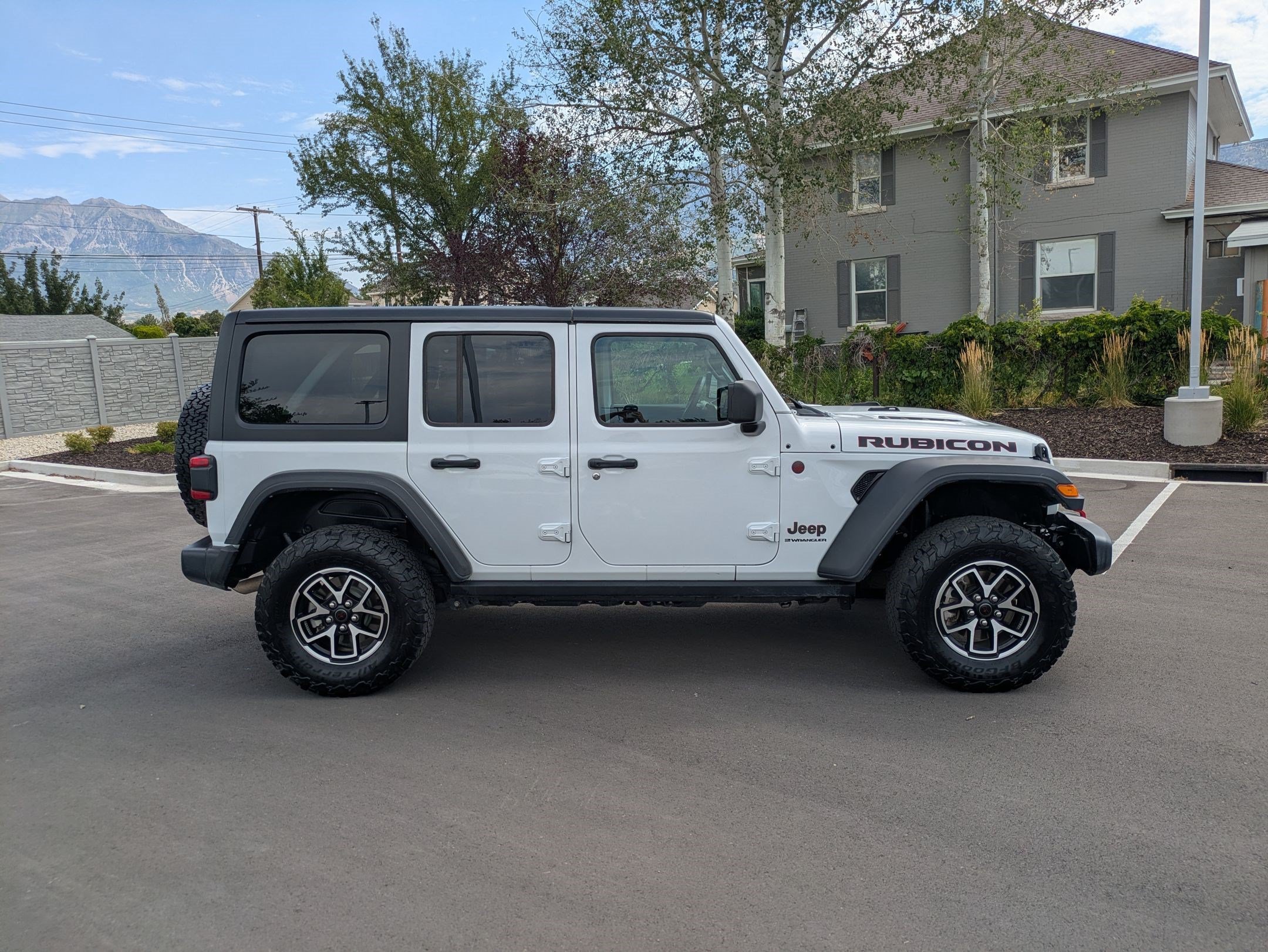 Used 2025 Bright White Clearcoat Jeep Rubicon image 2