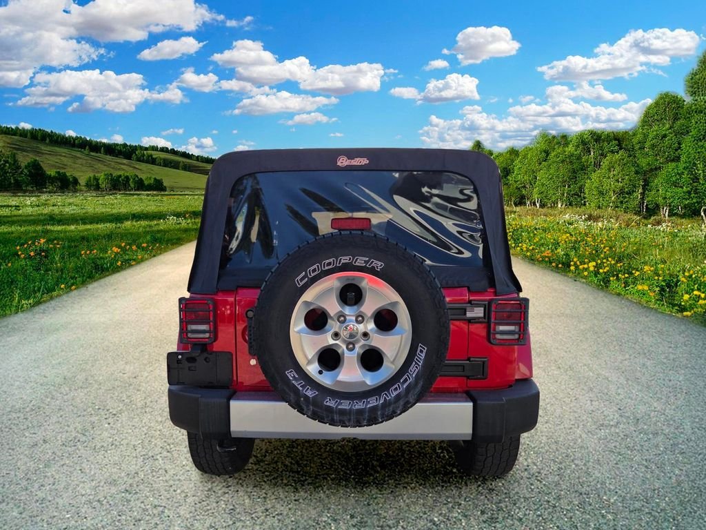 Used 2015 Red Jeep Unlimited Sahara image 5