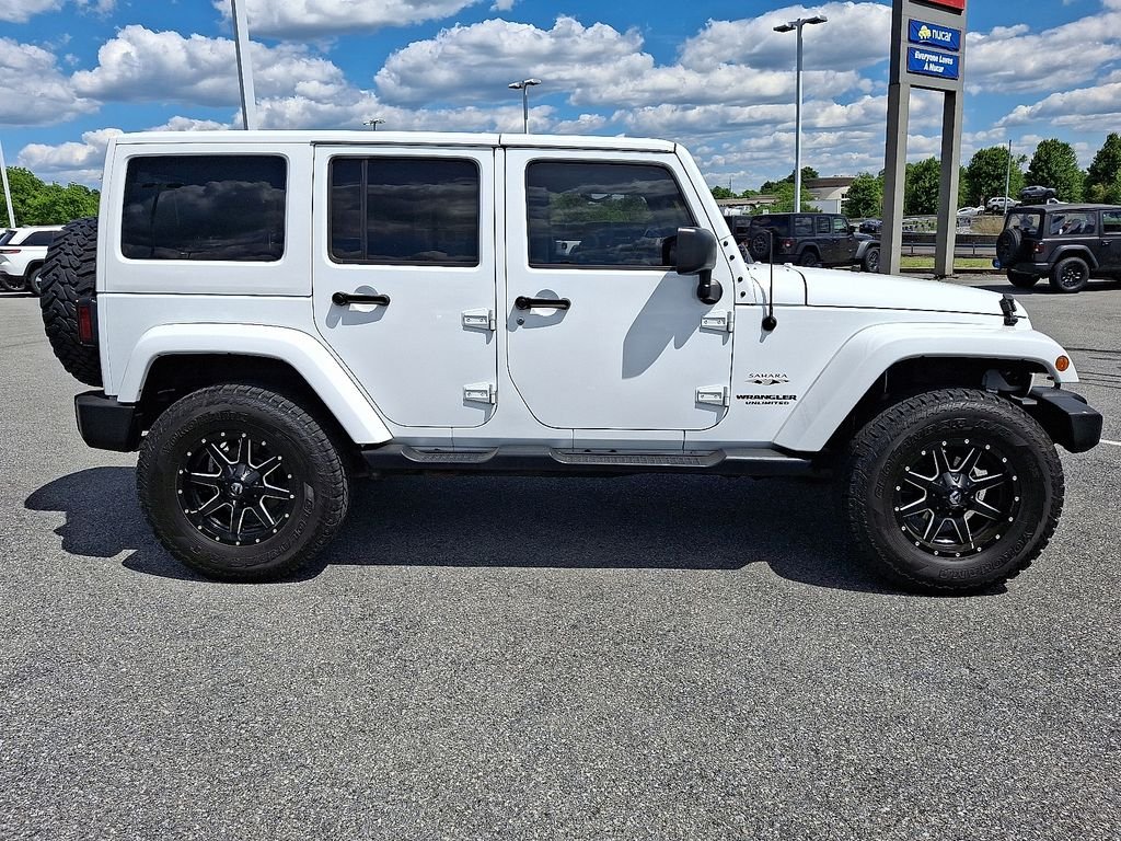 Used 2017 White Jeep Unlimited Sahara image 8