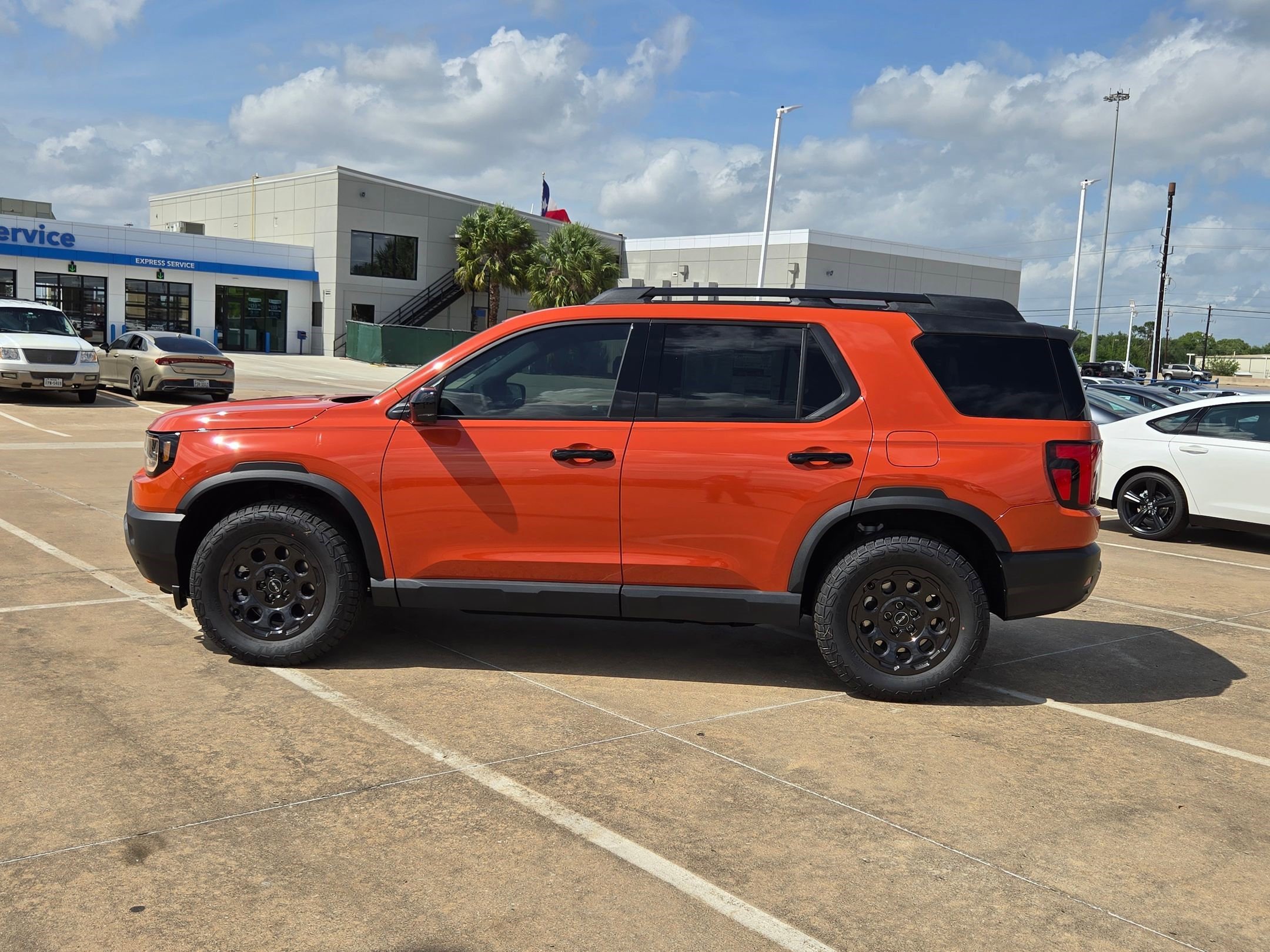 New 2026 Sunset Orange Honda TrailSport Elite Blackout image 7