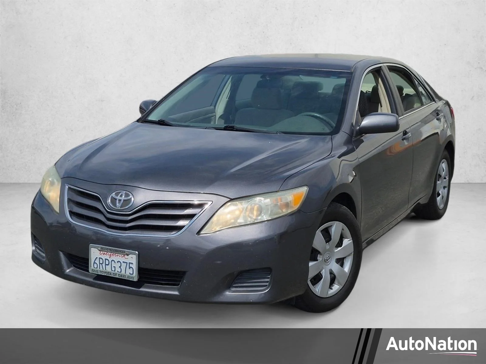 Used 2011 Magnetic Gray Metallic Toyota LE image 1