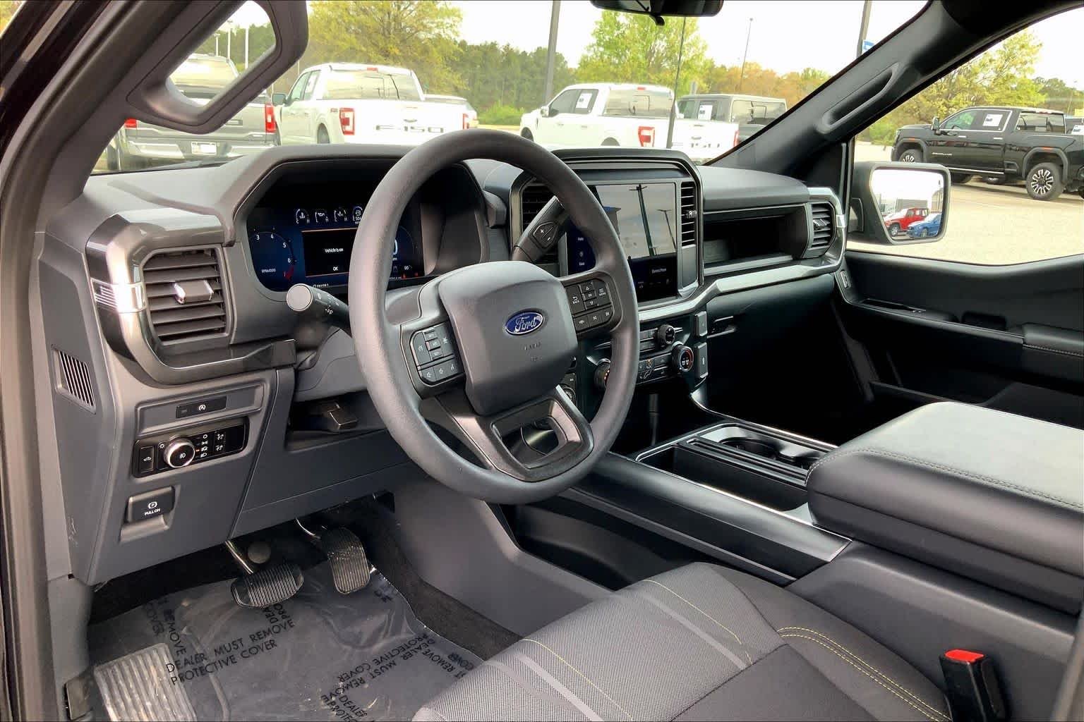 Used 2025 Agate Black Metallic Ford STX image 26