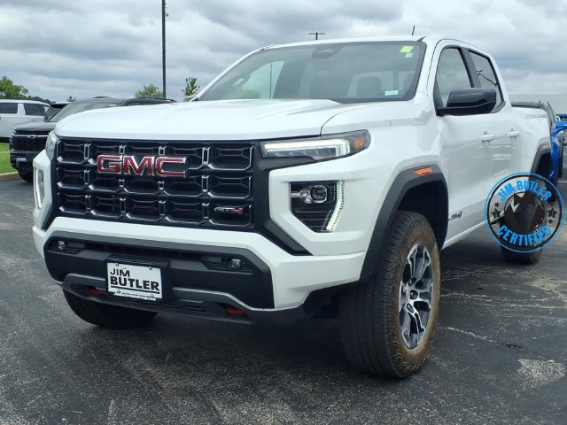 Used 2024 Summit White GMC AT4 image 1