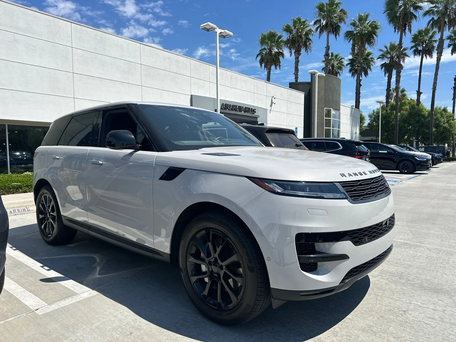 Used 2025 Borasco Gray Metallic Land Rover SE image 2