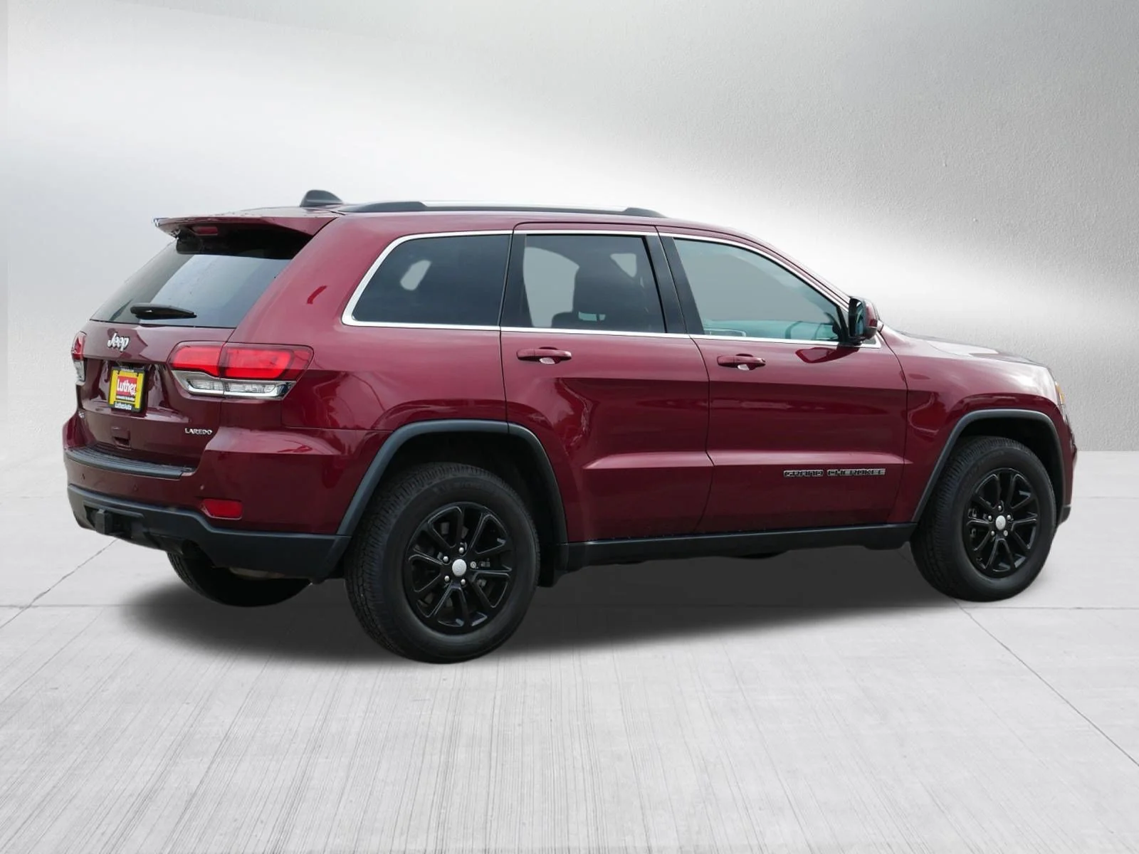 Used 2021 Velvet Red Pearlcoat Jeep Laredo E image 7