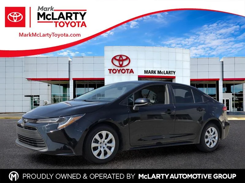 Used 2024 Midnight Black Metallic TOYOTA LE CVT image 1